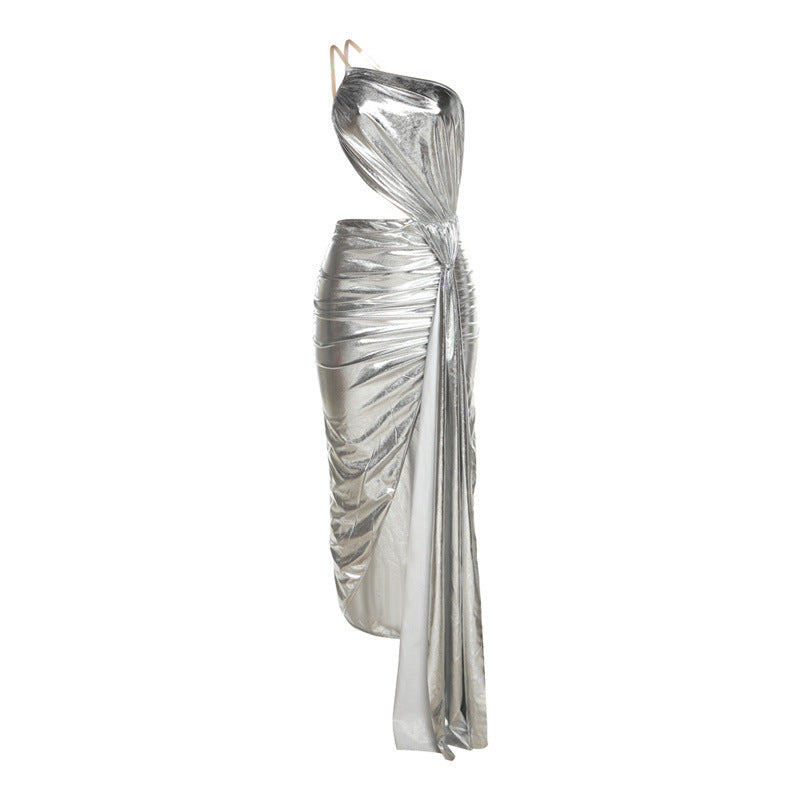Silver metallic dress with draped design on a white background